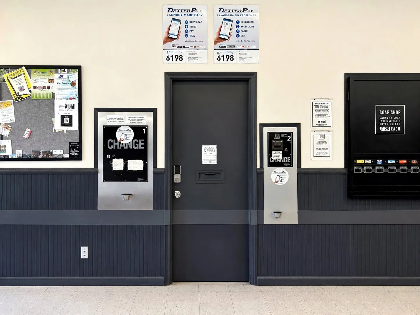 Change machines and DexterPay signs inside Bennett Valley Laundromat